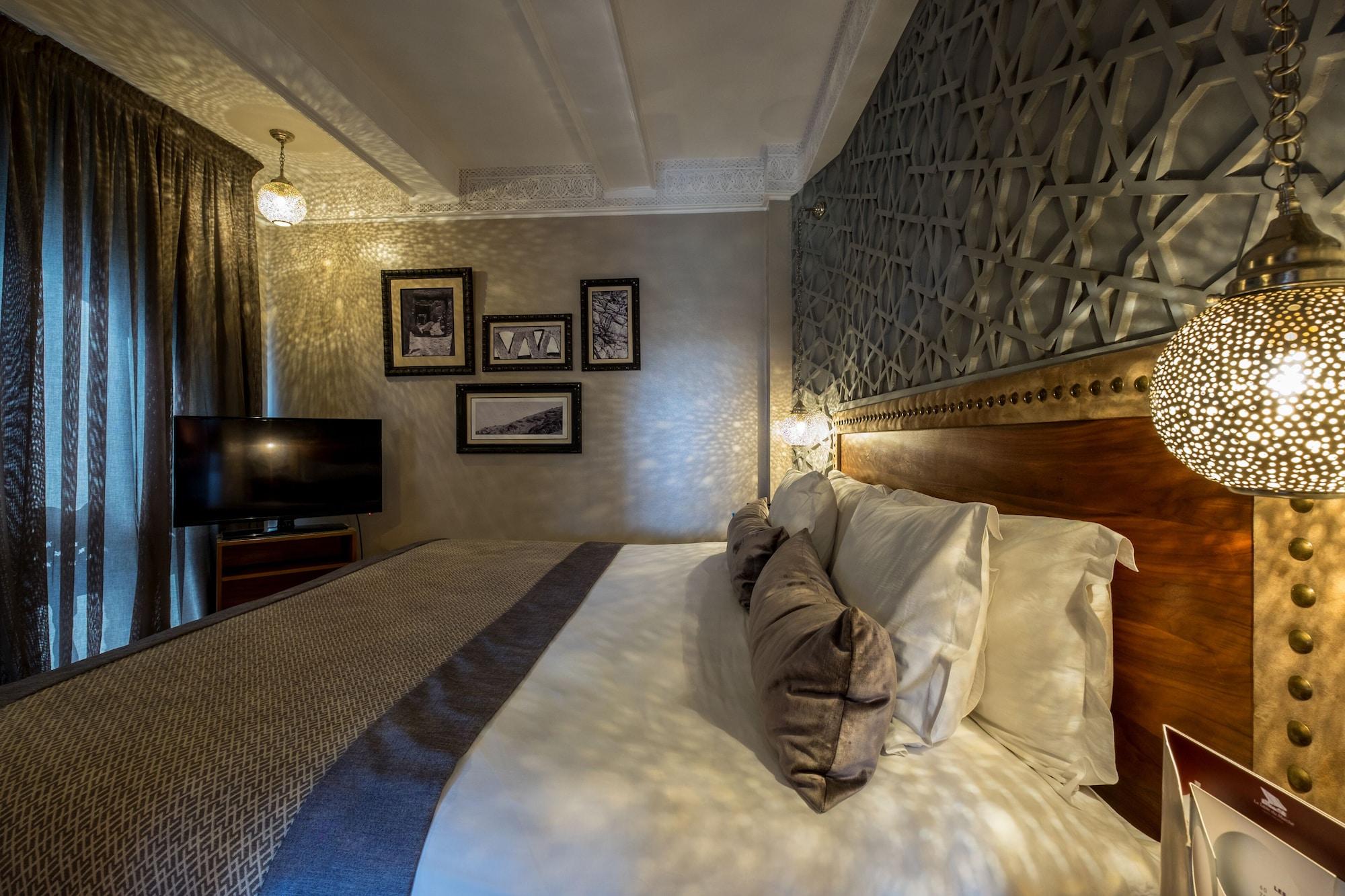 Hivernage Hotel & Spa Marrakesh Luaran gambar A bedroom at the hotel